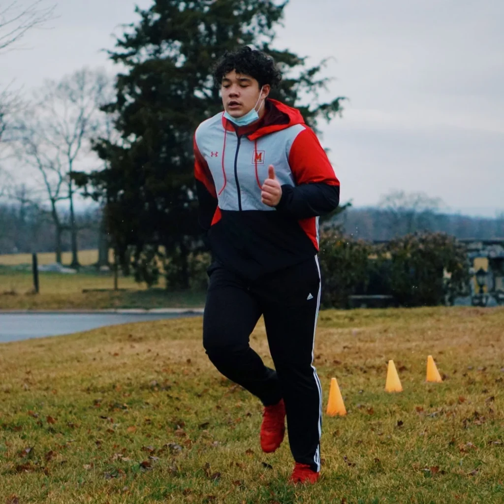 Athlete performing running cone drills